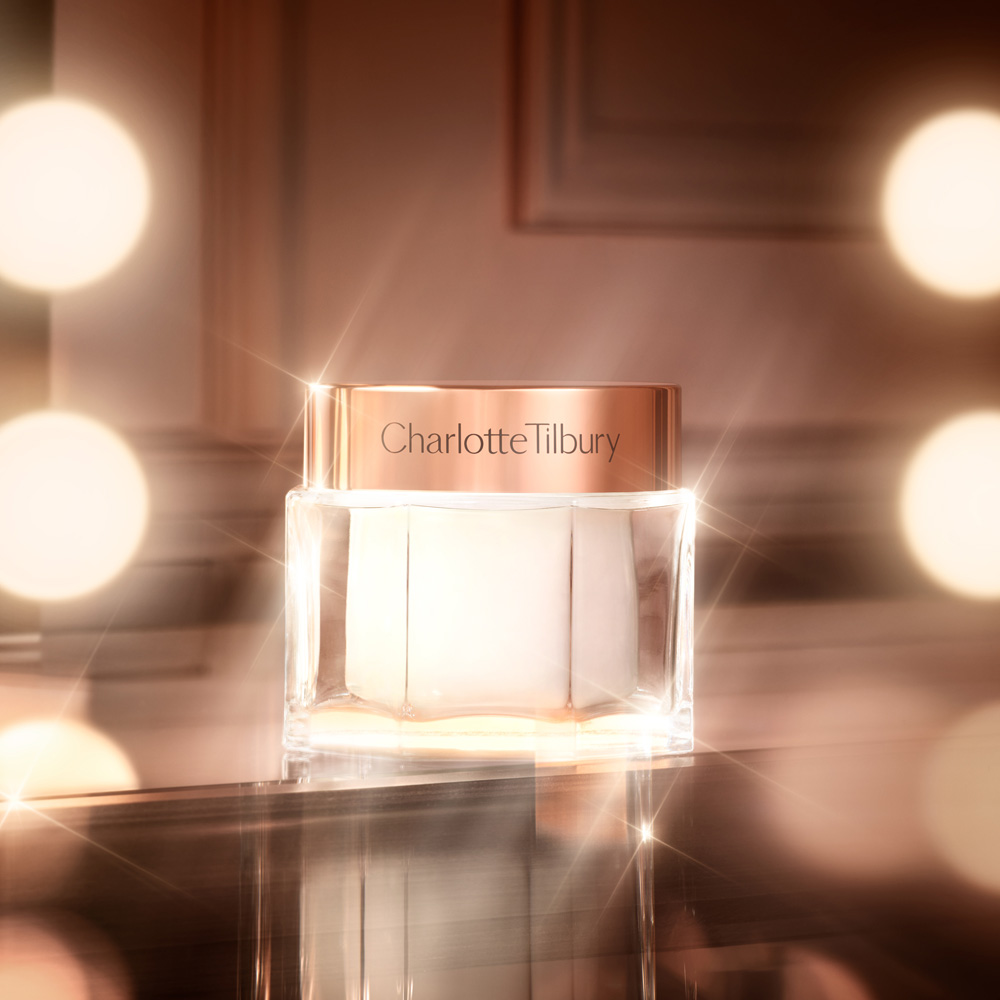 Disney 100  x Charlotte Tilbury limited-edition Charlotte's Magic Cream with Tinkerbell design on night sky backdrop