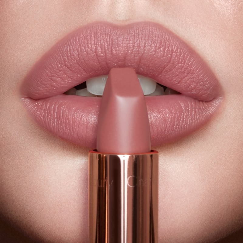 Disney 100  x Charlotte Tilbury limited-edition Charlotte's Magic Cream with Tinkerbell design on night sky backdrop