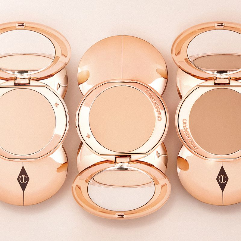 Disney 100  x Charlotte Tilbury limited-edition Charlotte's Magic Cream with Tinkerbell design on night sky backdrop
